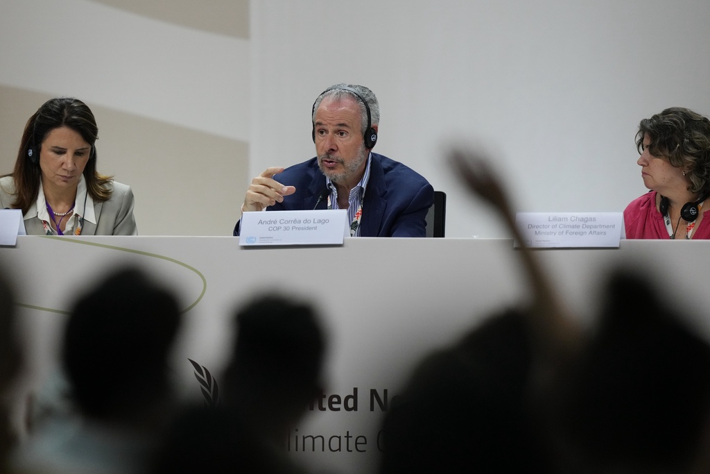 André Corrêa do Lago, COP30 president, center, speaks at a news conference next to Ana Toni, COP30 CEO, left, and Ambassador Liliam Chagas, director of the Climate Department, Brazil's Ministry of Foreign Affairs, at the COP30 U.N. Climate Summit, Wednesday, Nov. 12, 2025, in Belem, Brazil. (AP Photo/Fernando Llano)