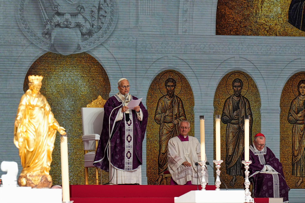 Pope Leo XIV delivers his homily during a mass at Stade Louis II in Fontvieille, Monaco, Saturday, March 28, 2026. (AP Photo/Laurent Cipriani)