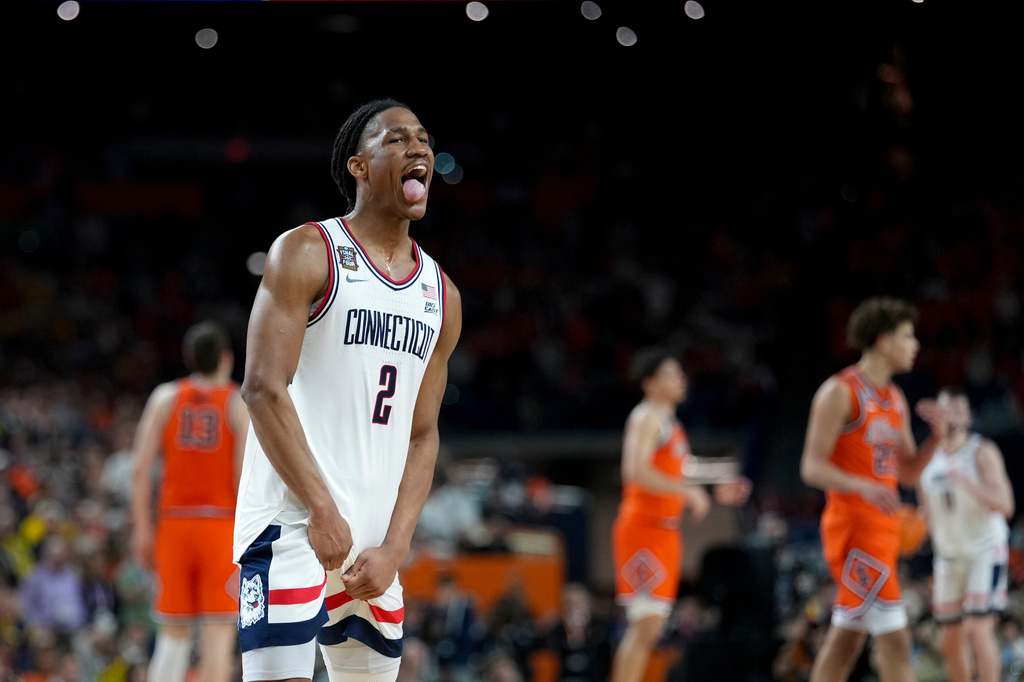 UConn guard Silas Demary Jr. celebrates after the second half of an NCAA college basketball tournament semifinal game against Illinois at the Final Four, Saturday, April 4, 2026, in Indianapolis. (AP Photo/Abbie Parr)