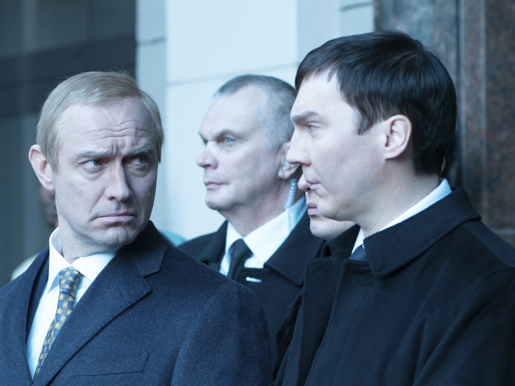 This image shows Jude Law, as Vladimir Putin, left, and Paul Dano, as Vadim Baranov, in a scene from "The Wizard of the Kremlin." (Carole Bethel/Cinetic Media via AP)