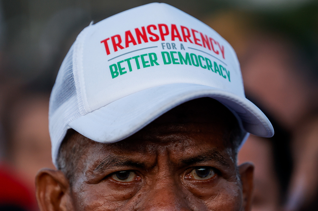 FILE - A member of the religious sect Iglesia Ni Cristo (Church of Christ) looks on during a three-day anti-corruption rally at Manila's Rizal Park, Philippines on Sunday, Nov. 16, 2025. (AP Photo/Mark Cristino, File)