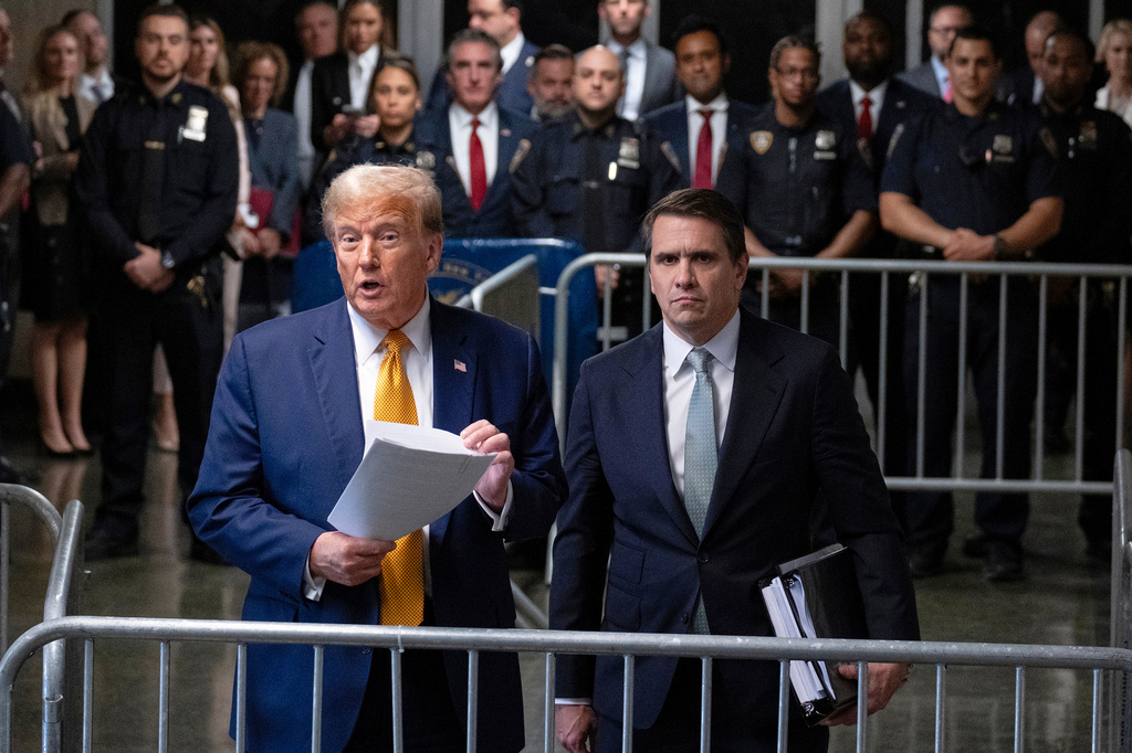 FILE - President Donald Trump, stands with then-defense attorney Todd Blanche, May 14, 2024, in New York. (AP Photo/Craig Ruttle, Pool, file)