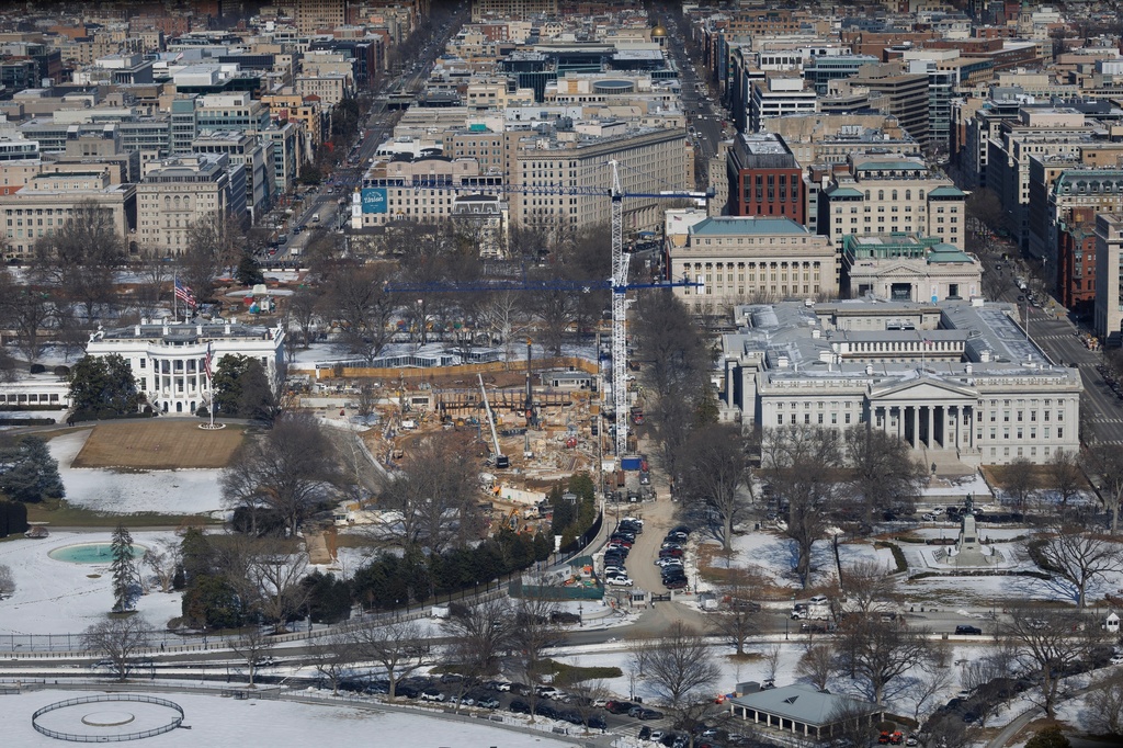 Constriction continues on the ballroom where the East Wing used to stand at the White House, Friday, Feb. 13, 2026, in Washington. (AP Photo/Tom Brenner)