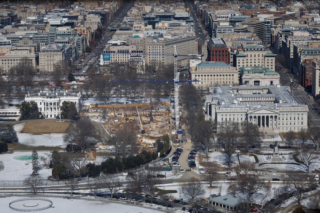 Construction continues on the ballroom where the East Wing used to stand at the White House, Friday, Feb. 13, 2026, in Washington. (AP Photo/Tom Brenner)