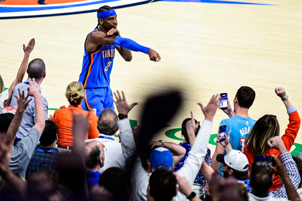 Oklahoma City Thunder guard Shai Gilgeous-Alexander (2) gestures during the second half of an NBA basketball game against the Denver Nuggets Monday, March 9, 2026, in Oklahoma City. (AP Photo/Gerald Leong)