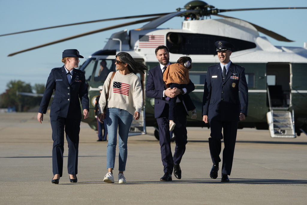 FILE - Vice President JD Vance and second lady Usha Vance walk toward Air Force Two at Joint Base Andrews, Md., Friday, Oct. 17, 2025. (Oliver Contreras/Pool via AP, File)