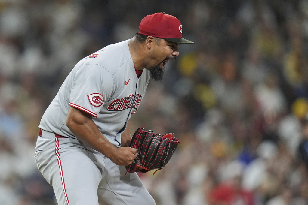Cincinnati Reds relief pitcher Tony Santillan celebrates after striking out San Diego Padres' Bryce Johnson during the ninth inning to end the baseball game Wednesday, Sept. 10, 2025, in San Diego. The Reds won, 2-1.(AP Photo/Gregory Bull)