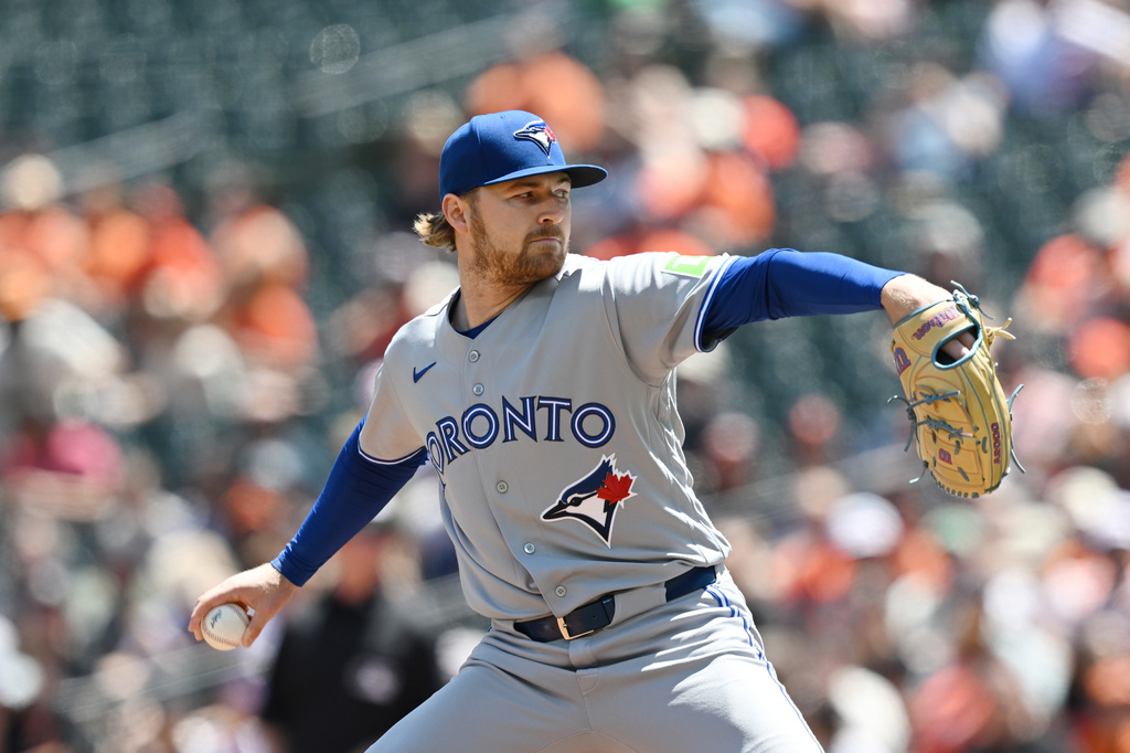 Toronto Blue Jays pitcher Spencer Miles (62) delivers a pitch against the Baltimore Orioles during the first inning of a baseball game, Sunday, May 31, 2026 in Baltimore. (AP Photo/Gail Burton)