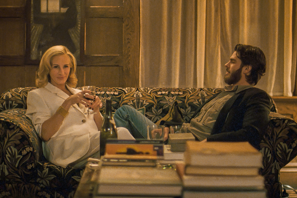 This image released by Amazon MGM Studios shows Julia Roberts, left, and Andrew Garfield in a scene from "After the Hunt." (Amazon MGM Studios via AP)