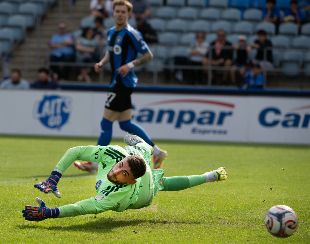 CF Montreal goalkeeper Thomas Gillier watches the ball sail into his net from a shot by Chicago Fire FC Robin Lod during the first half of an MLS soccer game in Montreal, Saturday May 16, 2026. (Peter McCabe/The Canadian Press via AP)