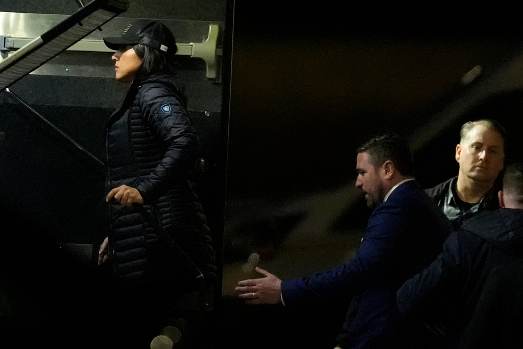 Director of National Intelligence Tulsi Gabbard, left, and FBI Deputy Director Andrew Bailey, enter a command vehicle as the FBI takes Fulton County 2020 Election ballots, Wednesday, Jan. 28, 2026, in Union City, Ga., near Atlanta. (AP Photo/Mike Stewart)