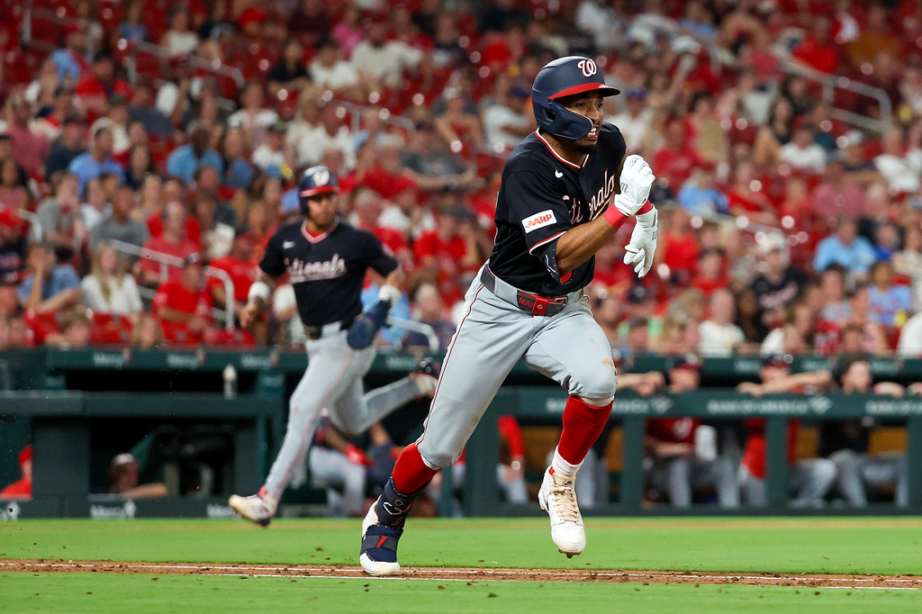 Washington Nationals' Nasim Nuñez runs on an RBI single during the sixth inning of a baseball game against the St. Louis Cardinals, Saturday, Sept. 19, 2026, in St. Louis. (AP Photo/Scott Kane)