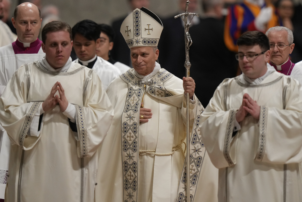 Pope Leo XIV arrives to preside over the first Vespers and the 'Te Deum' in St. Peter's Basilica at the Vatican, Wednesday, Dec. 31, 2025. (AP Photo/Andrew Medichini)