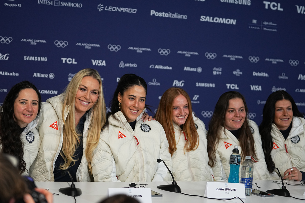 United States' Jackie Wiles, Lindsey Vonn, Isabella Wright, Mary Bocock and Breezy Johnson, from left, attend a press conference by the U.S. ski team at the 2026 Winter Olympics, in Cortina d'Ampezzo, Italy, Tuesday, Feb. 3, 2026. (AP Photo/Fatima Shbair)