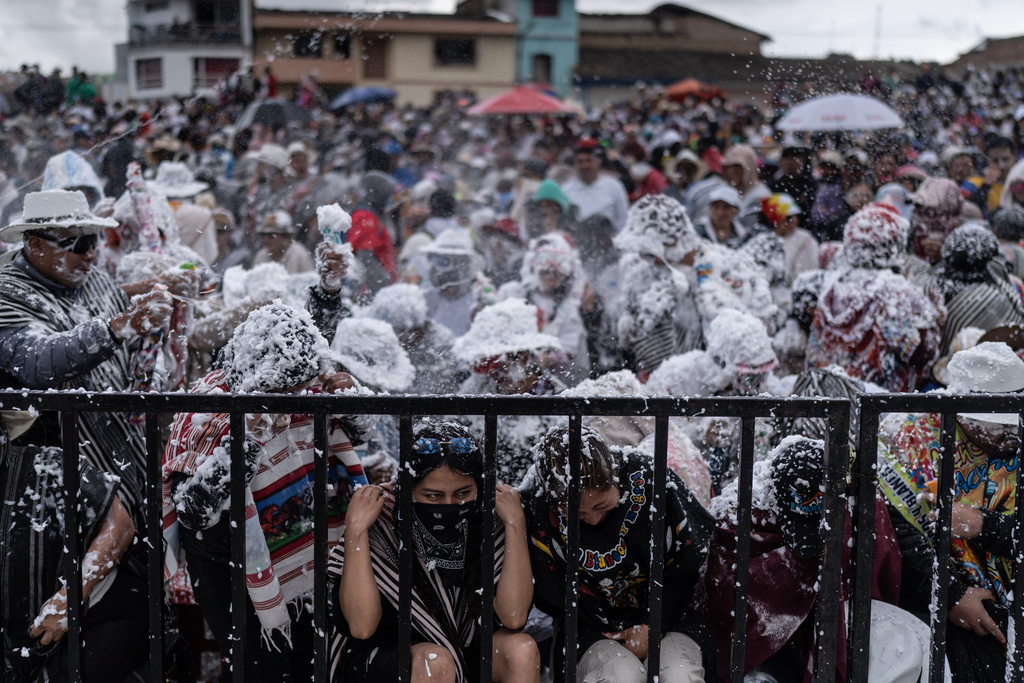 Revelers partake in the Black and White Carnival, recognized by UNESCO as Intangible Cultural Heritage, in Pasto, Colombia, Tuesday, Jan. 6, 2026. (AP Photo/Ivan Valencia)