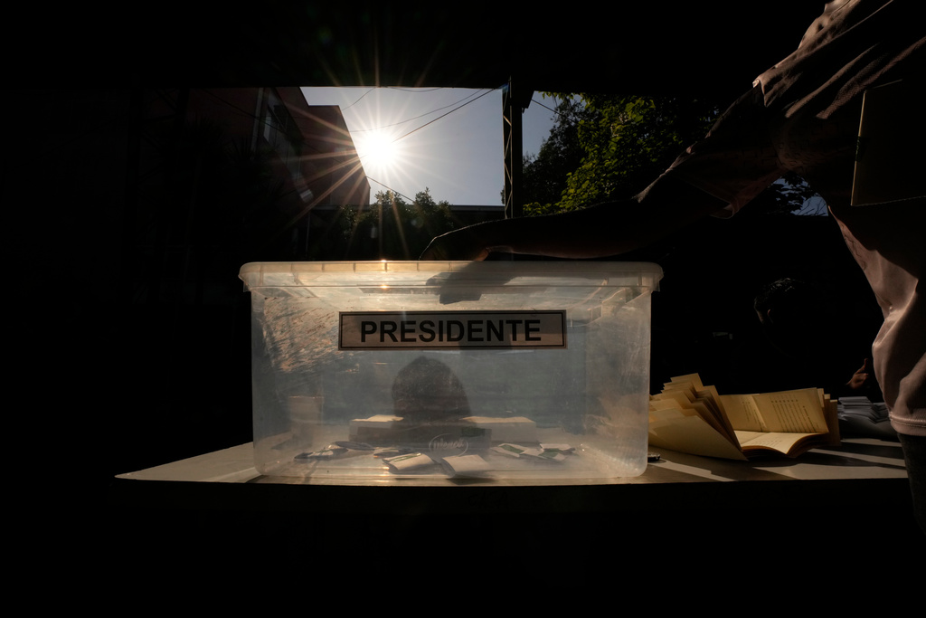A ballot box sits at a polling station during general elections in Santiago, Chile, Sunday, Nov. 16, 2025. (AP Photo/Esteban Felix)