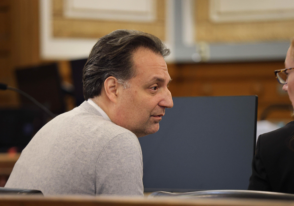 Brian Walshe, facing a first-degree murder charge for allegedly killing his wife Ana Walshe, speaks with his lawyer during testimony in his trial, Tuesday, Dec. 9, 2025, in Dedham, Mass. (Suzanne Kreiter/The Boston Globe via AP, File)