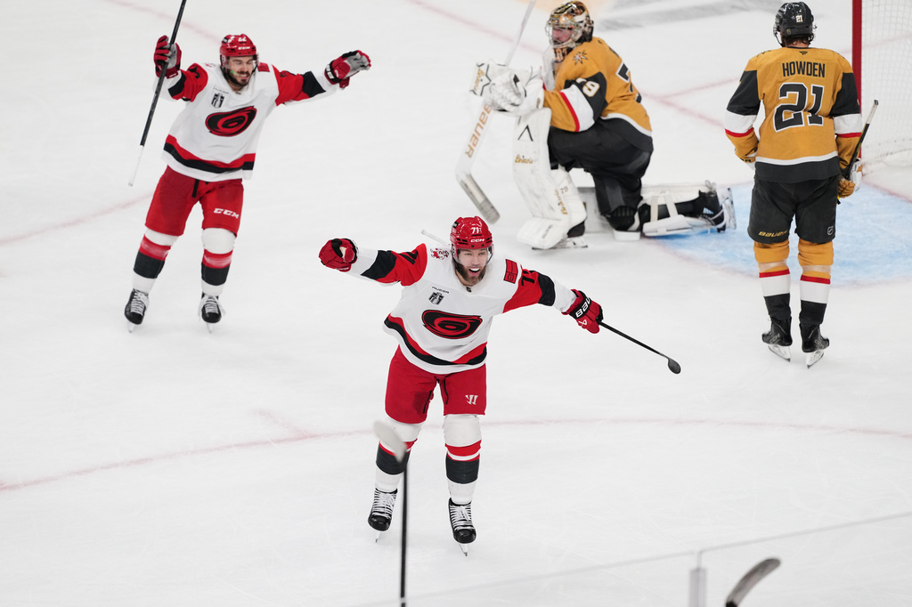 Carolina Hurricanes left wing Taylor Hall (71) celebrates after a goal by right wing Jackson Blake (53) during the second period in Game 6 of the NHL hockey Stanley Cup Final series against the Vegas Golden Knights, Sunday, June 14, 2026, in Las Vegas. (AP Photo/Candice Ward)