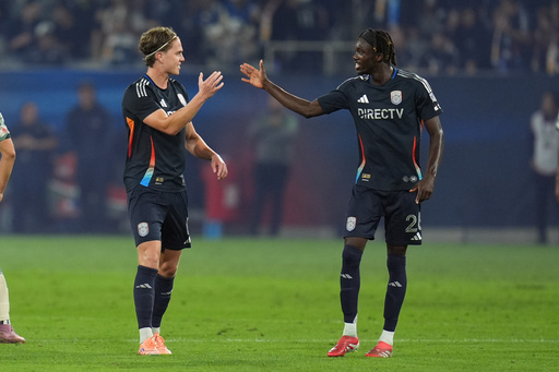 San Diego FC midfielder Onni Valakari, left, celebrates his goal with teammate midfielder Manu Duah, right, during the first half of Game 1 in the first round of MLS soccer's Western Conference playoff against Portland Timbers Sunday, Oct. 26, 2025, in San Diego. (AP Photo/Gregory Bull) San Diego FC midfielder Onni Valakari, left, celebrates his goal with teammate midfielder Manu Duah, right, during the first half of Game 1 in the first round of MLS soccer's Western Conference playoff against Portland Timbers Sunday, Oct. 26, 2025, in San Diego. (AP Photo/Gregory Bull)
