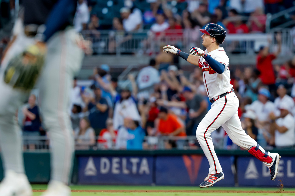 Atlanta Braves' Mike Yastrzemski reacts while rounding the bases after hitting a two-run home run against the Washington Nationals during the fifth inning of a baseball game, Thursday, July 30, 2026, in Atlanta. (AP Photo/Erik S. Lesser)