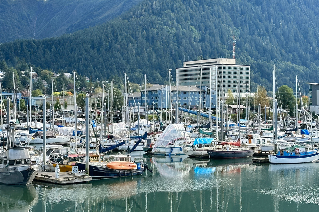 This photo taken with a smartphone shows boats docked in a harbor in Juneau, Alaska, Thursday, Sept. 24, 2026. (AP Photo/Becky Bohrer)