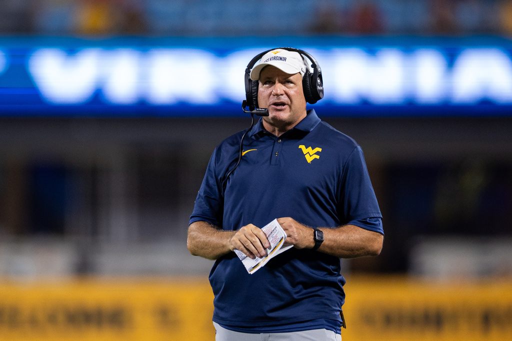 West Virginia head coach Rich Rodriguez looks on during the second half against Virginia in an NCAA college football game Saturday, Sept. 19, 2026, in Charlotte, N.C. (AP Photo/Scott Kinser)
