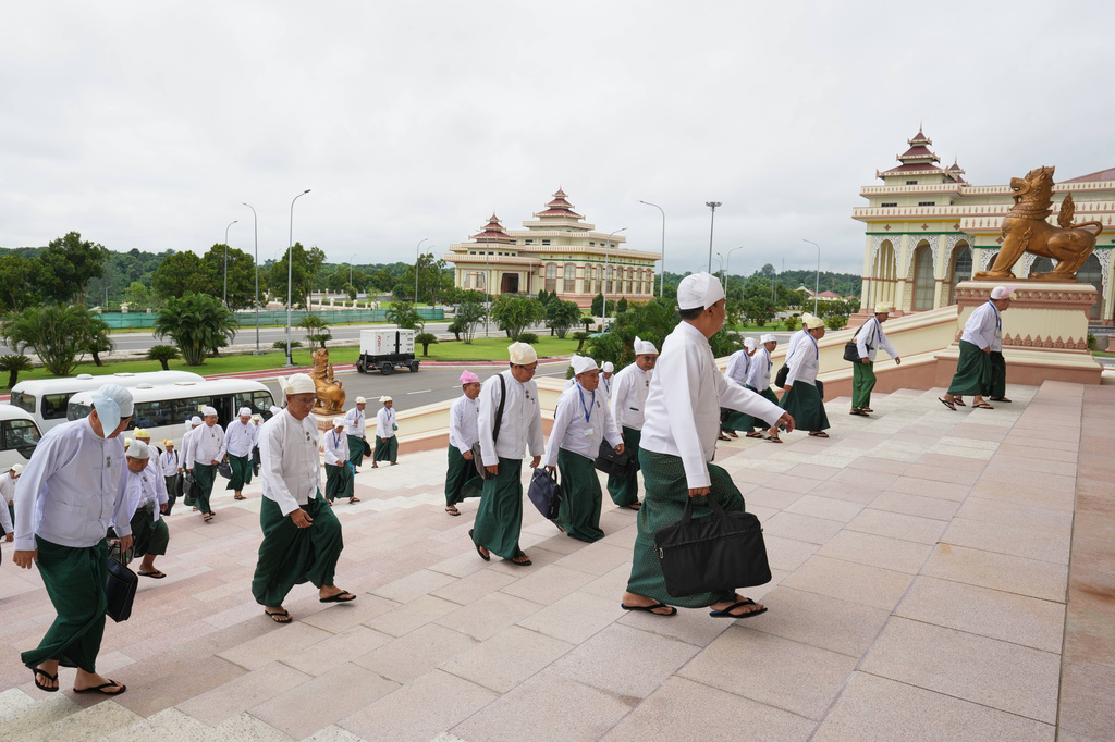 Myanmar’s lawmakers arrive to attend a regular session of the Union Parliament in Naypyitaw, Myanmar, Friday, July 31, 2026. (AP Photo/Aung Shine Oo)