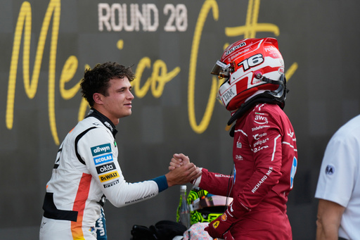 McLaren driver Lando Norris of Britain, left, the pole position winner, is congratulated by Ferrari driver Charles Leclerc of Monaco, who qualified second, during the qualifying session for Formula One Mexico Grand Prix auto race at the Hermanos Rodriguez race track in Mexico City, Saturday, Oct. 25, 2025. (AP Photo/Fernando Llano) McLaren driver Lando Norris of Britain, left, the pole position winner, is congratulated by Ferrari driver Charles Leclerc of Monaco, who qualified second, during the qualifying session for Formula One Mexico Grand Prix auto race at the Hermanos Rodriguez race track in Mexico City, Saturday, Oct. 25, 2025. (AP Photo/Fernando Llano)
