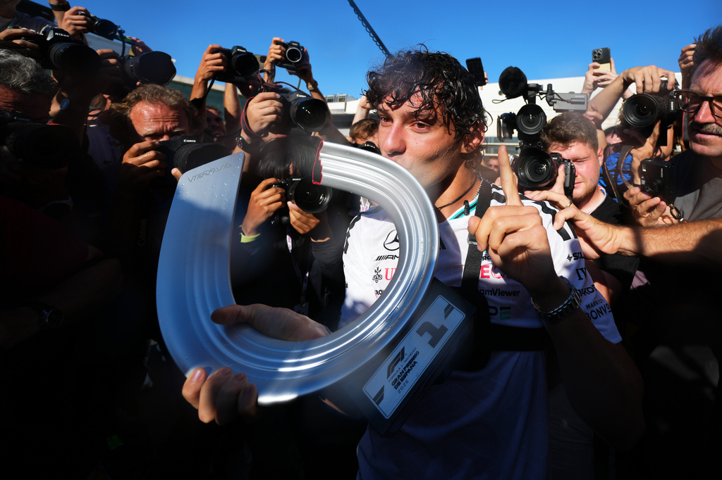 Mercedes driver Andrea Kimi Antonelli of Italy celebrates with his team after winning the Spanish Formula One Grand Prix race in Madrid, Sunday, Sept. 13, 2026. (AP Photo/Manu Fernandez)