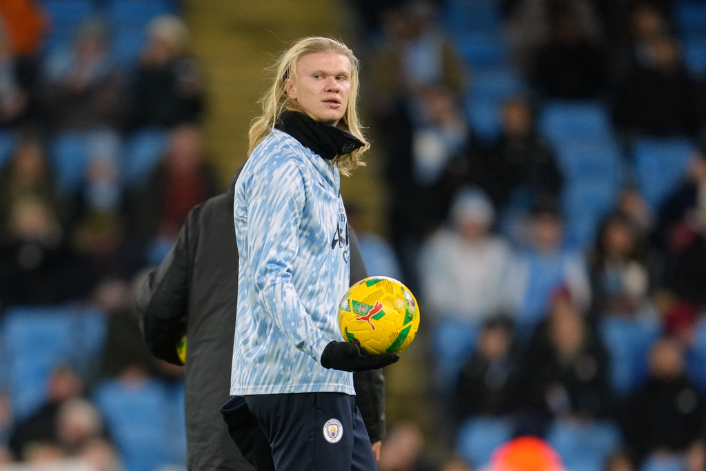 Manchester City's Erling Haaland warms up before the English League Cup soccer match between Manchester City and Brentford n Manchester, England, Wednesday, Dec. 17, 2025. (AP Photo/Jon Super)
