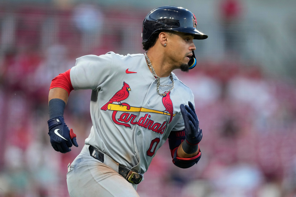 St. Louis Cardinals' Masyn Winn rounds the bases after hitting a solo home run in the fifth inning of a baseball game against the Cincinnati Reds, Tuesday, Aug. 18, 2026, in Cincinnati. (AP Photo/Carolyn Kaster)