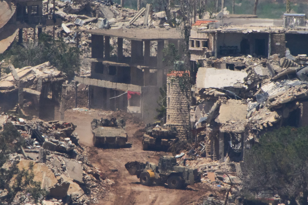 Israeli soldiers operate in southern Lebanon, as seen from northern Israel, Wednesday, April 29, 2026. (AP Photo/Ariel Schalit)