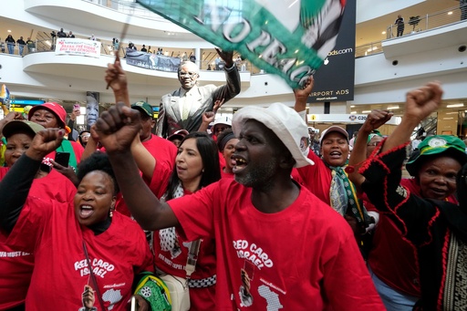 Activists sing as they welcome the members of the Global Sumud Flotilla, at OR Tambo International Airport, in Johannesburg, South Africa, Wednesday, Oct. 8, 2025. (AP Photo/Themba Hadebe) Activists sing as they welcome the members of the Global Sumud Flotilla, at OR Tambo International Airport, in Johannesburg, South Africa, Wednesday, Oct. 8, 2025. (AP Photo/Themba Hadebe)