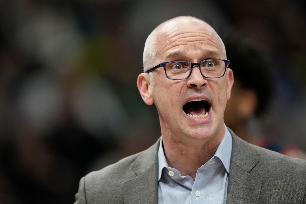 UConn head coach Dan Hurley reacts during the first half of an NCAA college basketball game against Marquette, Saturday, March 7, 2026, in Milwaukee. (AP Photo/Aaron Gash)