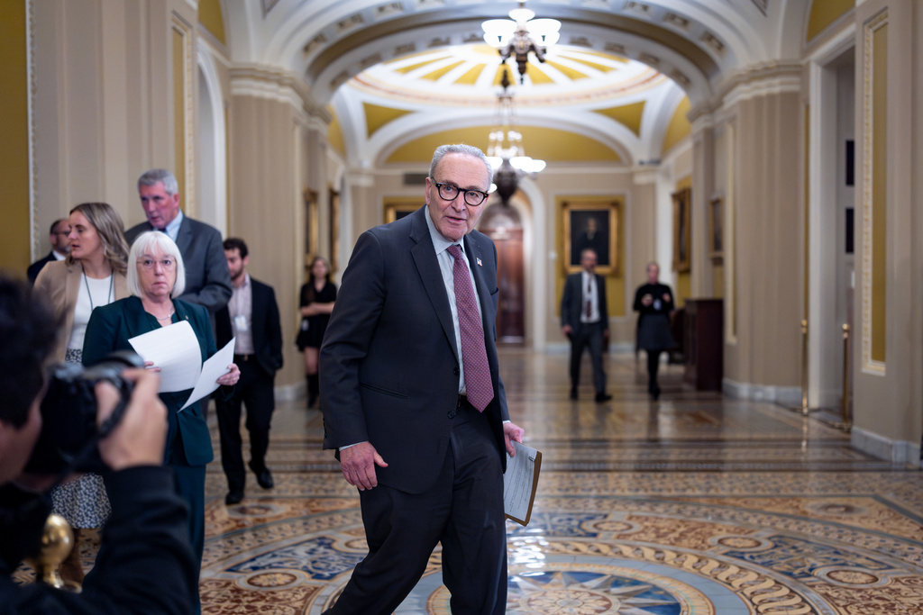 Senate Minority Leader Chuck Schumer, D-N.Y., arrives to meet with reporters following a closed-door session with fellow Democrats, on day 35 of the government shutdown, at the Capitol in Washington, Tuesday, Nov. 4, 2025. (AP Photo/J. Scott Applewhite)