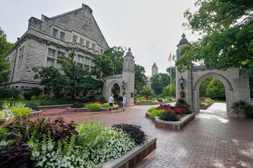 FILE - Guests walk on the campus of Indiana University, Thursday, July 17, 2025, in Bloomington, Ind. (AP Photo/Darron Cummings, File) FILE - Guests walk on the campus of Indiana University, Thursday, July 17, 2025, in Bloomington, Ind. (AP Photo/Darron Cummings, File)