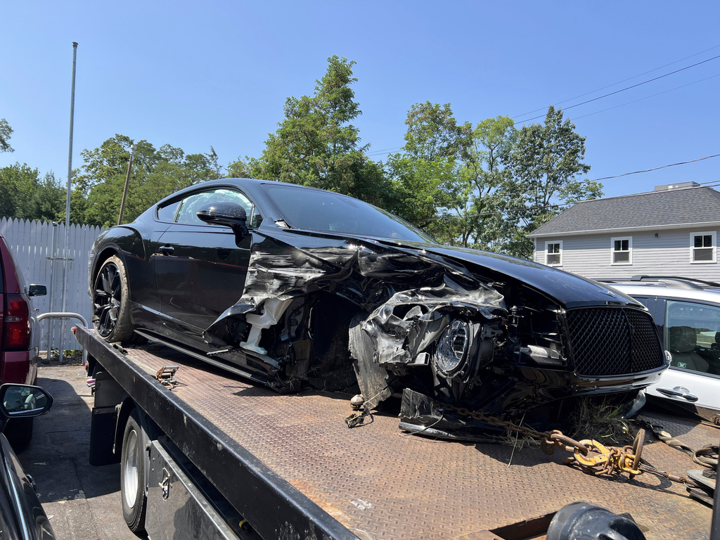 FILE - This July 24, 2025 photo provided by by Barbara Doran shows Vince McMahon's damaged vehicle on a tow truck in Westport, Conn, where the car was towed to after an accident. (Barbara Doran via AP, File)