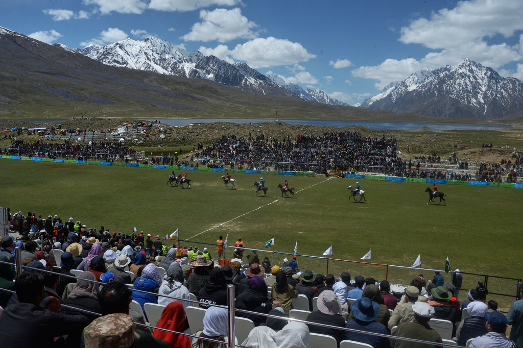 Spectators watch the opening match during the three-day annual Shandur Polo Festival in Shandur Pass, in the Ghizer district of Gilgit-Baltistan, northern Pakistan, Thursday, June 11, 2026. (AP Photo/Zubair Abbasi)