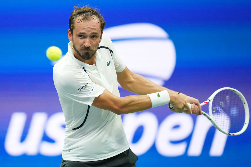 Daniil Medvedev, of Russia, returns the ball to Hugo Gaston, of France, during the first round of the U.S. Open tennis championships Sunday, Aug. 30, 2026, in New York. (AP Photo/Kirsty Wigglesworth)