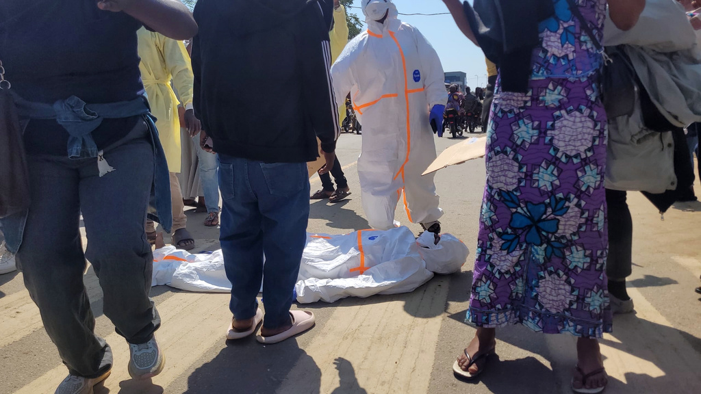 Health workers at the epicenter of the Ebola outbreak protest over unpaid wages at the provincial governor's office in Ituri, eastern Congo, Thursday, Aug. 6, 2026. (AP Photo/Constant Same Bagalwa)