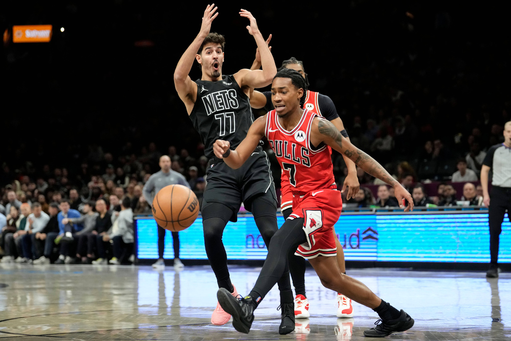 Brooklyn Nets guard Ben Saraf (77) reacts as he gets fouled during the first half of an NBA basketball game against the Chicago Bulls, Monday, Feb. 9, 2026, in New York. (AP Photo/Yuki Iwamura)