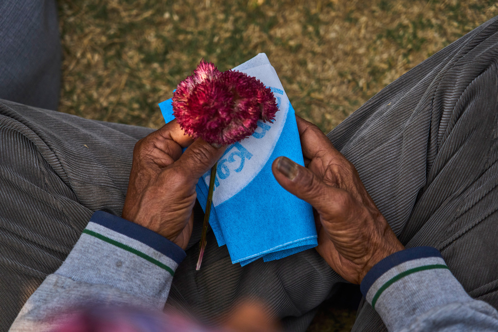 A Rastriya Swatantra Party supporter waits for the arrival of prime ministerial candidate and rapper-turned-politician Balendra Shah at an election campaign rally in Chitwan, approximately 180 kilometers (112 miles) west of Kathmandu, Nepal, Friday, Feb. 27, 2026. (AP Photo/Niranjan Shrestha)