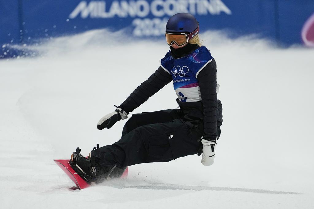 Austria's Anna Gasser competes during the women's snowboarding big air finals at the 2026 Winter Olympics, in Livigno, Italy, Monday, Feb. 9, 2026. (AP Photo/Lindsey Wasson)