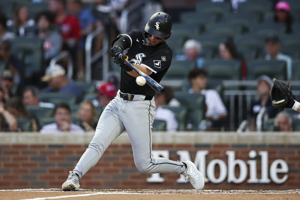Chicago White Sox's Brooks Baldwin hits a home run in the third inning of a baseball game against the Atlanta Braves, Monday, Aug. 18, 2025, in Atlanta. (AP Photo/Colin Hubbard)