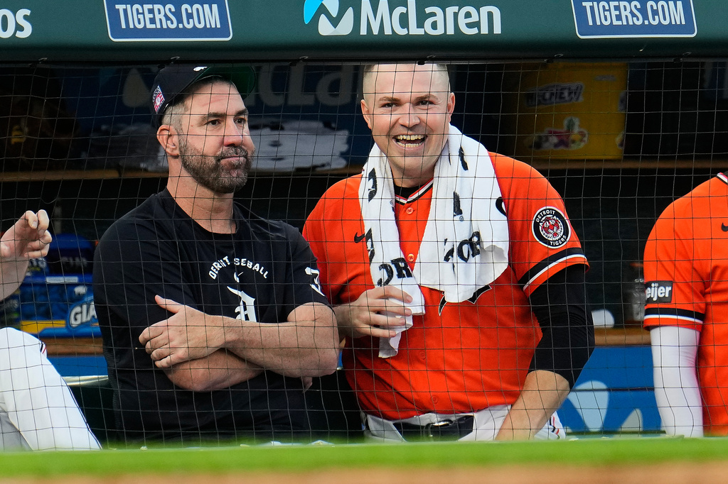 Detroit Tigers Justin Verlander, left, sits with Tarik Skubal, right, during the eighth inning of a baseball game against the Kansas City Royals Friday, July 24, 2026, in Detroit. (AP Photo/Paul Sancya)