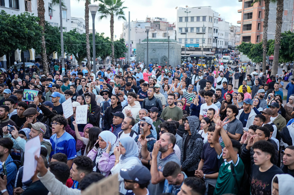 People take part in a youth led protest against corruption and calling for healthcare and education reforms, in Casablanca, Morocco, Sunday, Oct. 5, 2025. (AP Photo/Mosa'ab Elshamy)