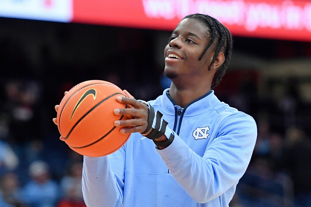 FILE - North Carolina forward Caleb Wilson (8) shoots before an NCAA college basketball game against Syracuse, Saturday, Feb. 21, 2026, in Syracuse, N.Y. (AP Photo/Adrian Kraus,File)