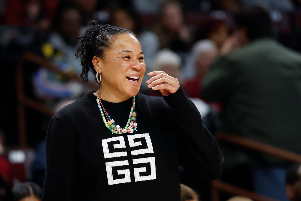 South Carolina head coach Dawn Staley watches her team play against North Carolina Central during the second half of an NCAA college basketball game in Columbia, S.C., Sunday, Dec. 7, 2025. (AP Photo/Nell Redmond)