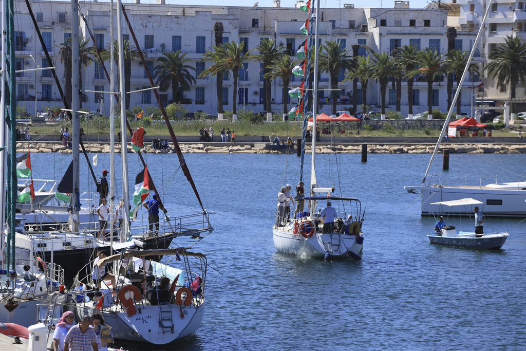 A boat that is part of the Global Sumud Flotilla departs to Gaza to deliver aid amidst Israel's blockade on the Palestinian territory, in the Tunisian port of Bizerte, Saturday, Sept. 13, 2025. (AP Photo/Anis Mili)