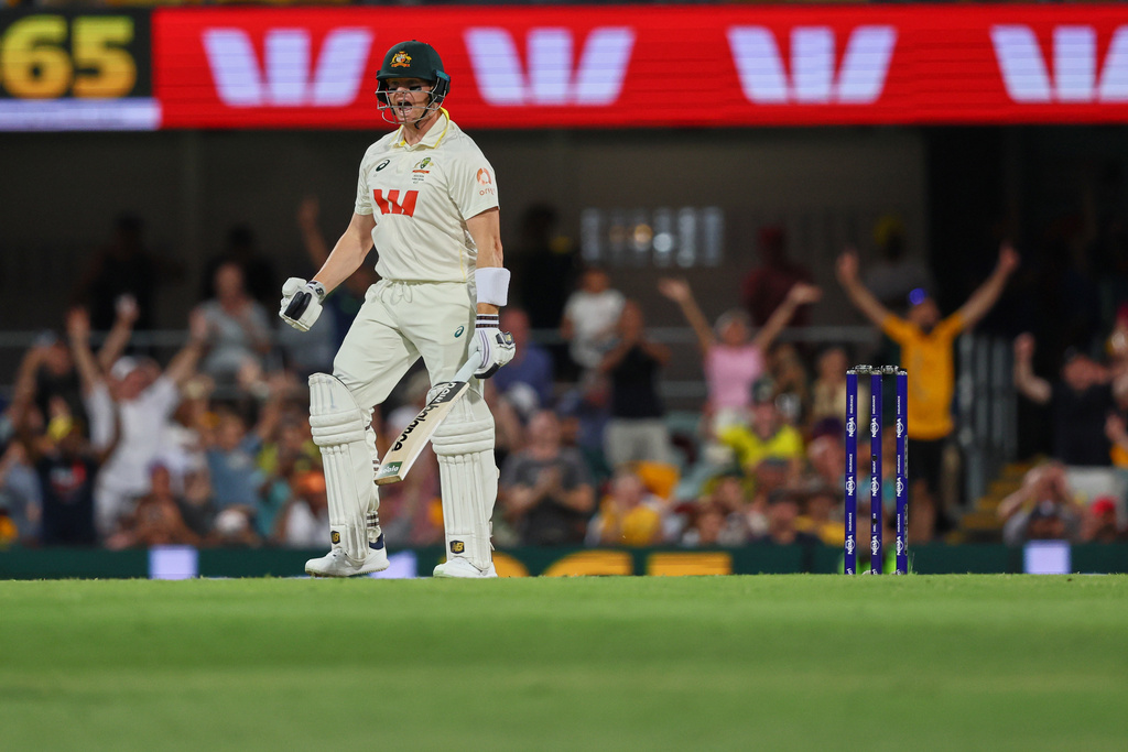 Australia's captain Steve Smith reacts after winning the second Ashes cricket test match between Australia and England in Brisbane, Sunday, Dec. 7, 2025.. (AP Photo/Tertius Pickard)